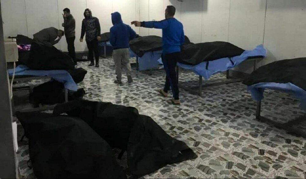 (تصویر) انتقال پیکر شهدای حمله هوایی به فرودگاه بغداد